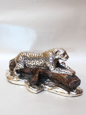 JAGUAR CHICO EN TRONCO ARTESANÍAS DE PLATA