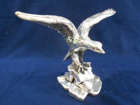 ÁGUILA EN PIEDRA ARTESANÍAS EN PLATA